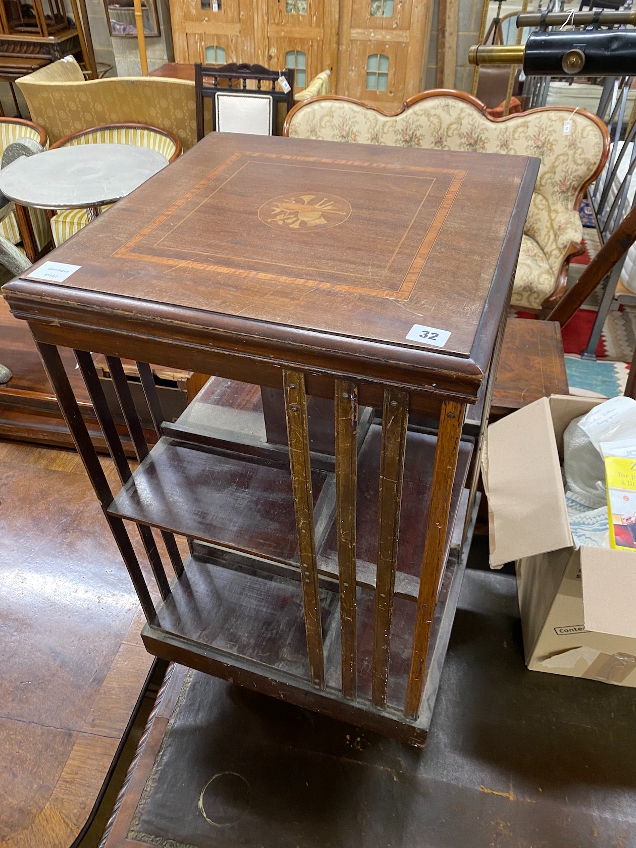 An Edwardian inlaid mahogany revolving bookcase, width 46cm, height 83cm